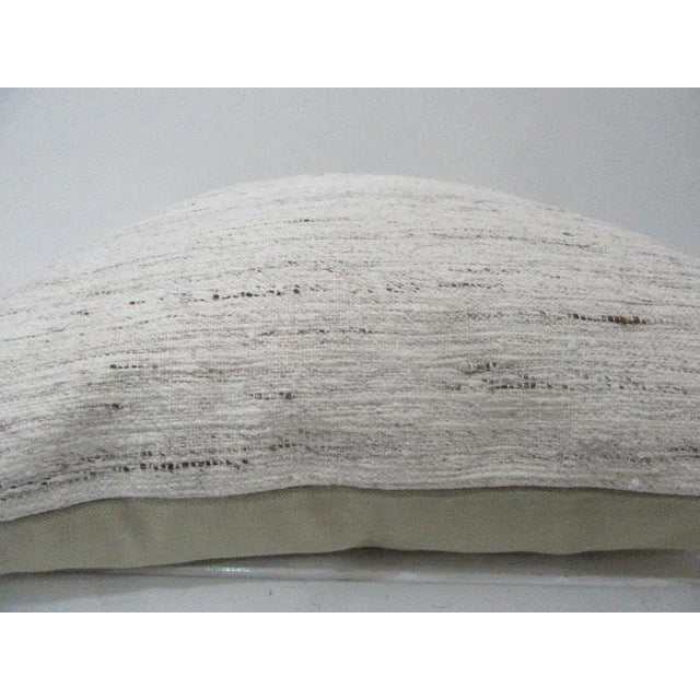 This is a pillow cover made from a vintage kilim rug. The piece was properly washed and ready to use. Pillow inserts not...