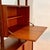 This elegant, Italian-made single-span shelving unit dates back to the 1960s. Made from fine teak with a warm, exposed...