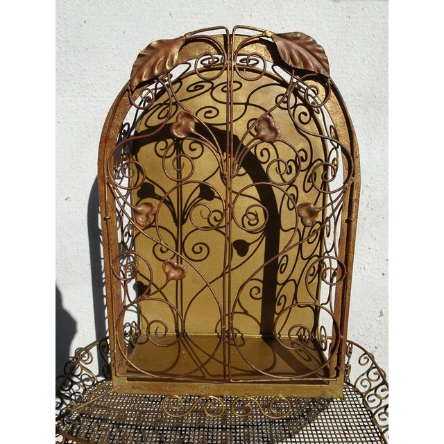 The gilding shows some wearing and I think the inside cabinet was repainted in time with gold paint. Outside original...