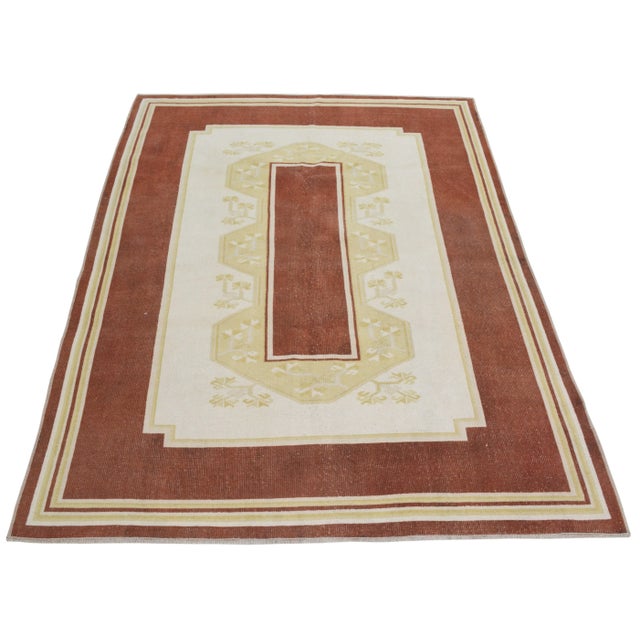 Vintage Turkish Oushak hand knotted rug with natural colors, contemporary style and soft texture.