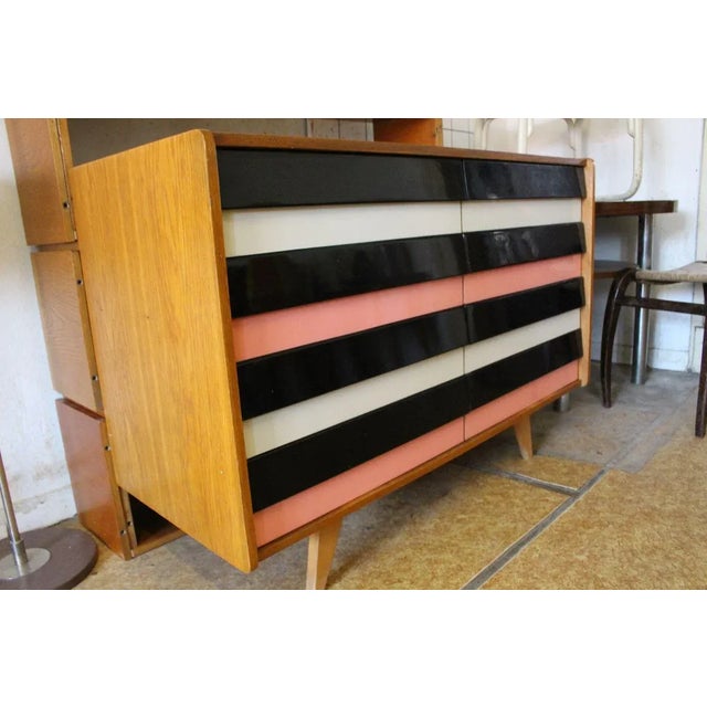 Original vintage chest of drawers U453 Manufactured in the 1960s by Interier Praha Designed by Jiri Jiroutek Drawers are...