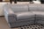 A 4pc vintage sectional sofa. This sofa set features a simple postmodern design, timeless and chic, featuring a dove gray...