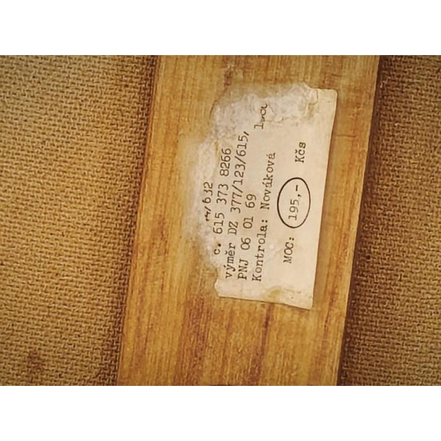 Mid-Century Modern Upholstered Stool with Sculptural Seat and Beech Wood Legs, Czechoslovakia, 1960s An elegant vintage...