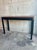 A refined mid-century console table by J.B. Van Sciver Co., dating to the 1950s. The table features a clean, architectural...