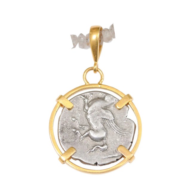 This silver Corinthian "stater" [coin] is from the Acarnania area of ancient Greece, and was minted circa 320-280 BC. On...