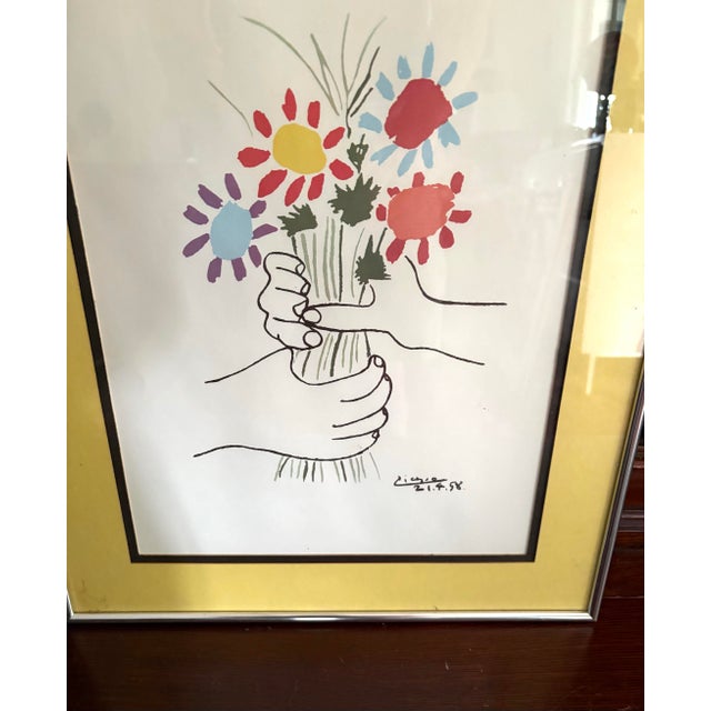 Pablo Picasso's artwork titled "Bouquet of Peace" or "Bouquet of Flowers" (also known as "Le Fleurs En Main" or "Hands...