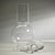 A modern, contemporary glass vase with a slender neck and robust center, suitable for flowers, or being displayed empty....