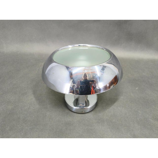 Original Art Deco wall light manufactured by Drupol in Czechoslovakia in the 1940s. This piece features a refined circular...