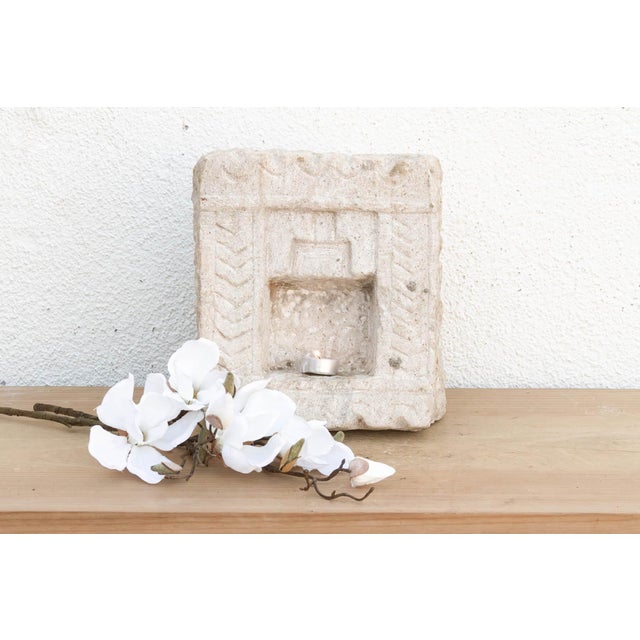 Carved from solid stone, this antique wall niche—traditionally known as a Gokha—was originally embedded into the masonry...