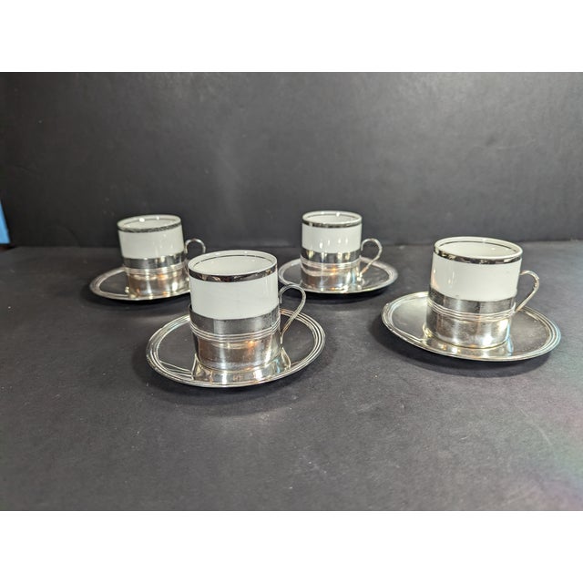 This listing includes 4 porcelain and silver plate Demitasse espresso coffee cups with matching silverplate saucers. This...