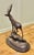 Signed Bronze Sculpture of a Stag Standing on a Rock set on a Marble Plinth A great Charming piece on an Animal theme...
