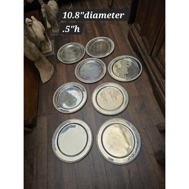 Great looking heavy Silverplated plates. These work beautifully as under plates for a fancy table setting.