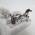 A vintage miniature depicting a racehorse with jockey, handcrafted in 800/000 silver in Italy between the 1980s and 1990s,...