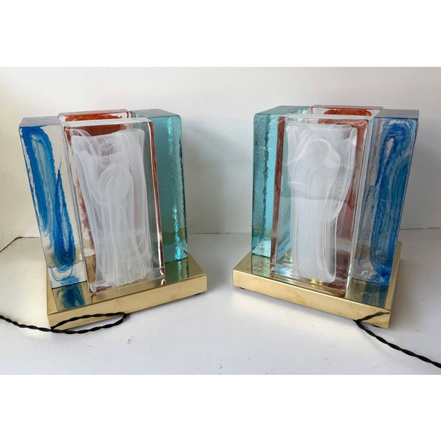 Pair of contemporary table or bedside lamps cubic pennellate pressed red, blue, white Murano glass block cube and brass...