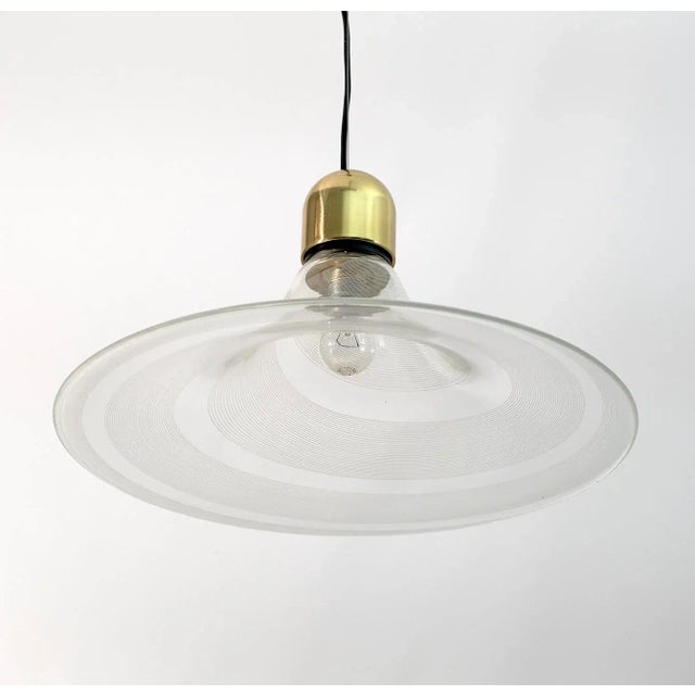 Stunning Murano glass pendant lamp, made by Murano glass masters, blown glass technique, spiral shape. This piece is...