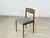 For sale is a stylish vintage dining chair from the 1960s. The chair impresses with its sleek design, gently curved...