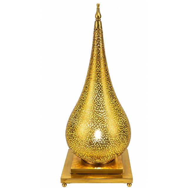 Bring the enchanting atmosphere of Marrakech into your home with this beautiful handmade Moroccan brass floor lantern,...