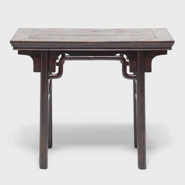 Straight lines and subtle curves flow together seamlessly in this elegant mid-19th-century table made in Shanxi province....