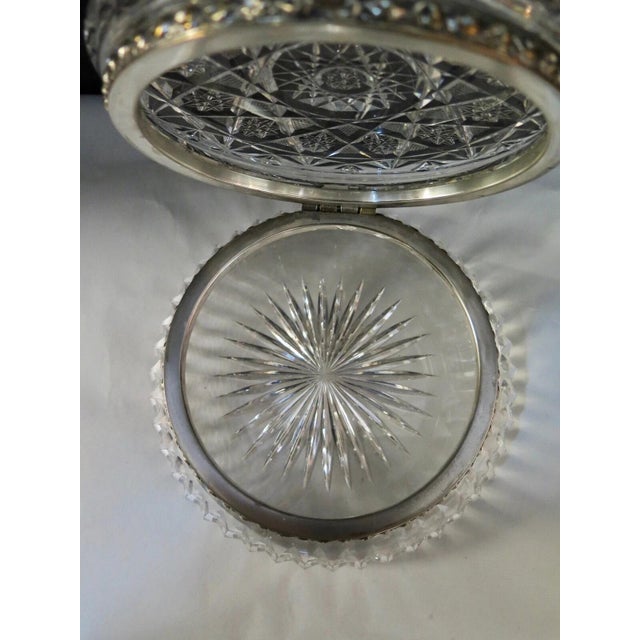 This vintage early 20th century ladies vanity box is beautifully designed with a sparkling American cut crystal motif. The...