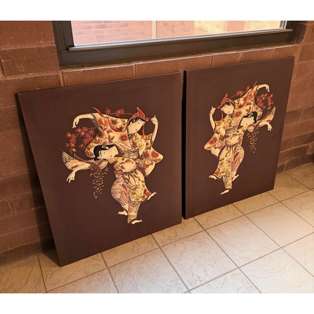 Pair of vintage textile relief wall panels featuring layered kimono-clad figures rendered in sculptural padded appliqué....