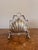 Antique Silver Plated Folding Shell Biscuit Box having an ornately decorated shell case with original ornate frame and...