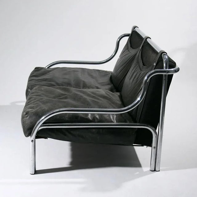“Stringa” sofa black leather upholstery on a tubular chrome frame, designed by Gae Aulenti for Poltronova 1965 Italy. This...