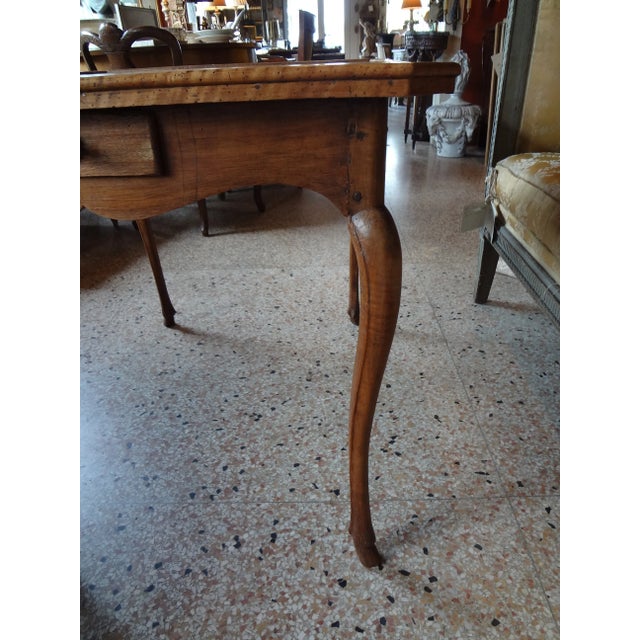 French 18th century period Louis XV leather game table with cabriole legs ending in a hoof and a scallop apron. Two...