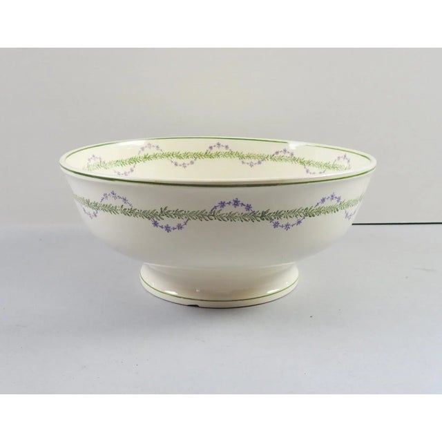 Large footed serving bowl. Marked Longwy France pattern Loridan, green laurel leaf and lavender garland border design. Two...