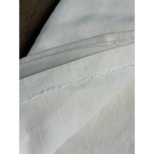 This pair of curtain panels were custom made. The linen fabric is a beautiful mellow honey color.the seams are hand sewn....