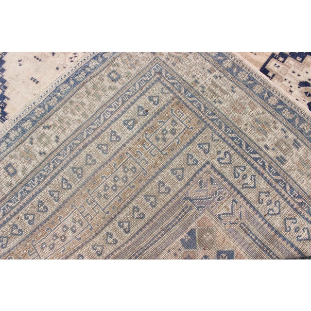 Beige Vintage Turkish Oushak Rug Featuring Soft Beige Field With Navy Tribal Design For Sale - Image 8 of 9
