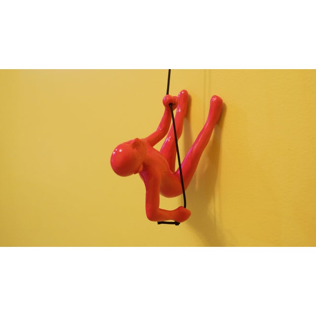 Contemporary Pink Climbing Man Wall Art For Sale - Image 3 of 5