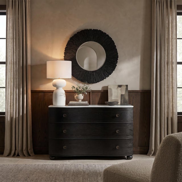 Cast aluminum construction gives the Bardot Metal Table Lamp it's organic shape and sculptural presence. Drawing...