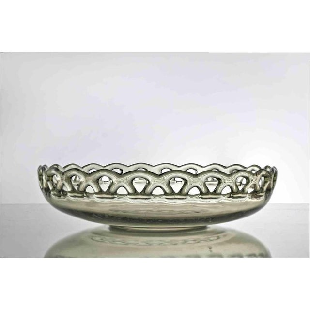 Vintage Art Glass Plate realized in Italy in 1970. Transparent beige with yellow nuances. Very good condition.