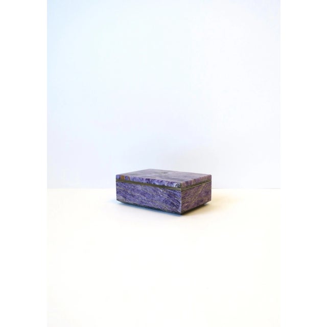 A very beautiful, substantial and rare natural purple charoite jewelry box, circa late-20th century. Charoite is rare...