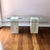 Gorgeous pair of travertine, brass and glass topped end tables. Made in Italy, circa 70s for Artedi. The glass tops are...