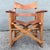 A distinctive vintage folding rocking chair handcrafted in Costa Rica, combining a warm solid wood frame with beautifully...