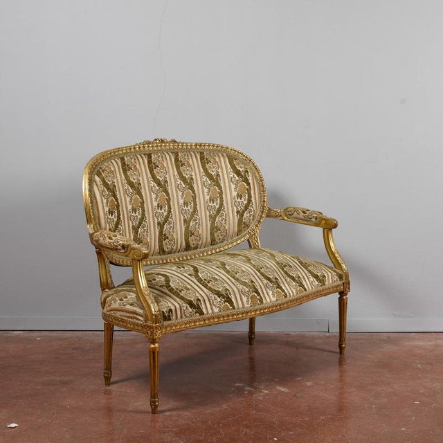 This napoleon iii-style two-seater sofa, or canapé, is a magnificent antique that reflects the opulence and decoration...