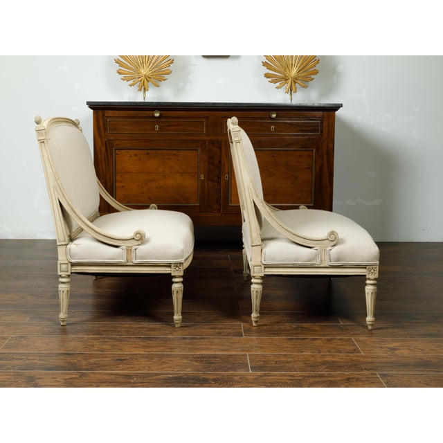Early 20th Century Pair of French 1900s Louis XVI Style Walnut Settees with Scrolling Arm Supports For Sale - Image 5 of 8