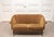 1940s Swedish two-seater sofa upholstered in bronze-coloured velour. The design features softly curved lines, elegantly...