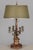 A vintage Italian bouillotte style lamp made in Italy by The Champman Manufacturing Company. Turned wood base with brass...