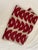 A beautiful table runner from British designer Molly Mahon in linen. This is the iconic "Luna" pattern in a cranberry...