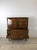 This mid century modern highboy dresser by United Furniture Co. features hardwood construction, original walnut finish,...