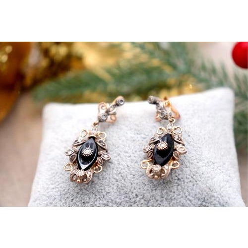 Gold and Silver Earrings with Diamond Chips, Set of 2, in Very Good conditions. Designed 1920 to 1949 This piece has an...