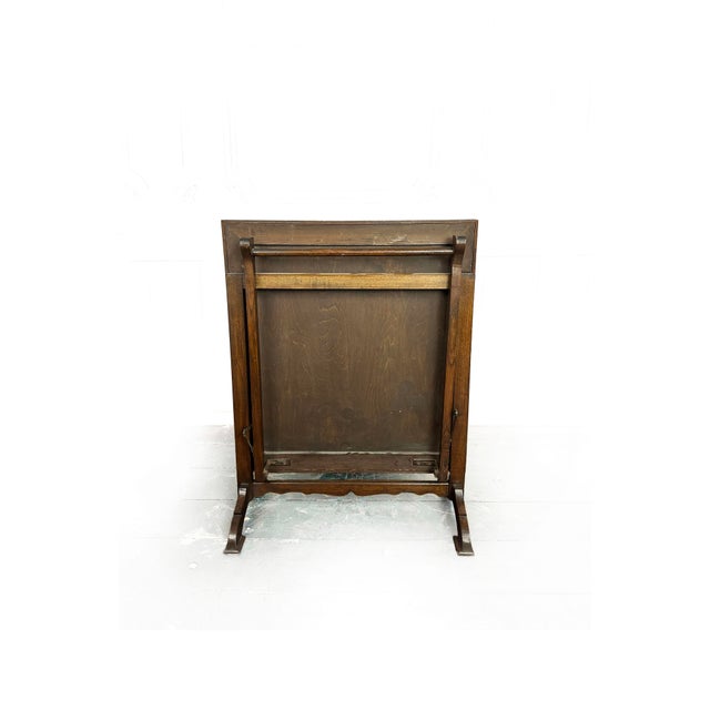 A rare and beautifully engineered piece of victorian ingenuity, this metamorphic mahogany fire screen converts...