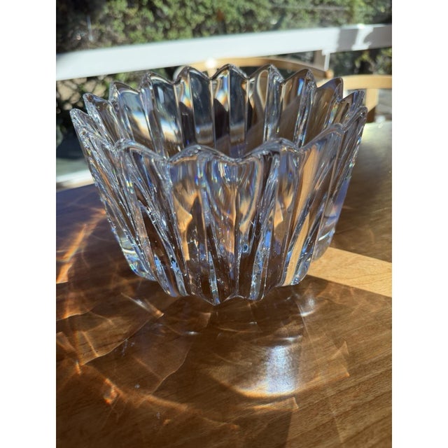 Elegant signed Orrefors crystal bowl, hand-crafted in Sweden and executed in thick, high-quality clear lead crystal with...
