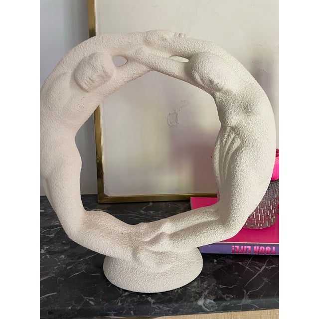Large organic Vintage sculptural object featuring a striking circular form with textured coral-inspired detailing....