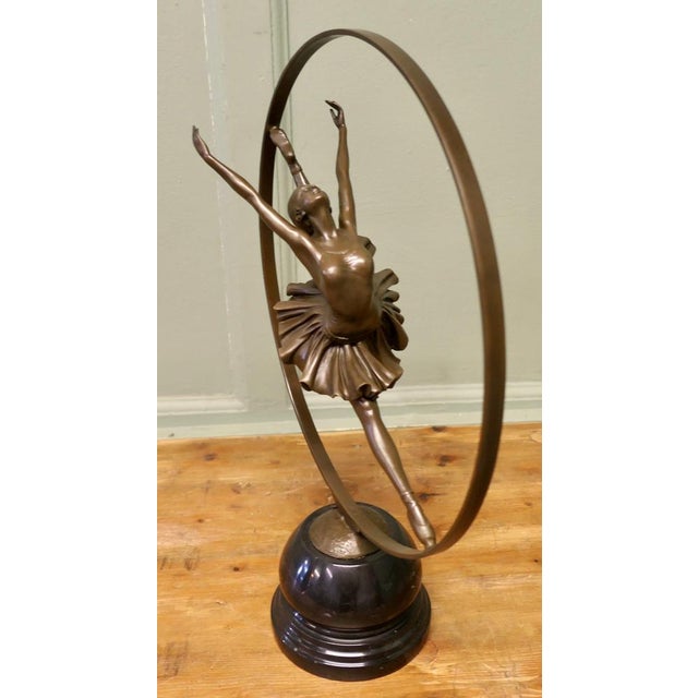 Art Deco Bronze Ballerina signed “La Danseuse” by Pierre Collinet Signed Bronze Art Deco Hoop Dancer after a fabulous...
