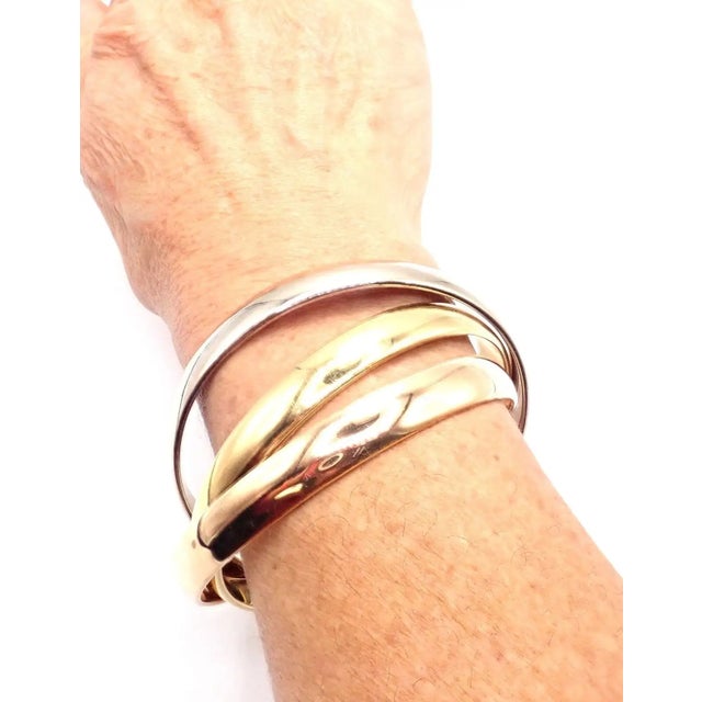 Gold 1990s Cartier Trinity Rolling Tricolor Gold Large Model Bangle Bracelet For Sale - Image 8 of 9