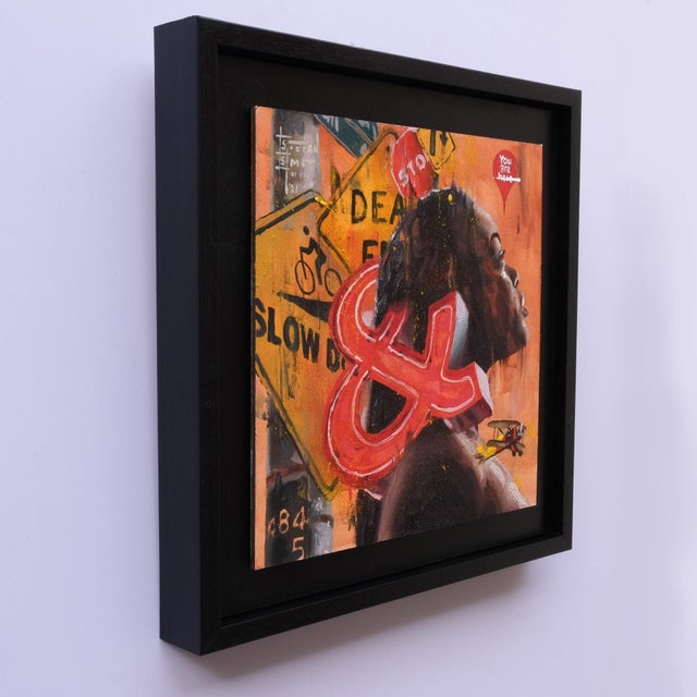 The artwork features a dynamic interplay of bold colors and abstract shapes, creating a vivid sense of movement and...