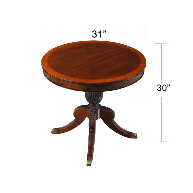The elegant and refined Round Mahogany Pineapple Table from Niagara Furniture boasts a fantastic base carved to resemble...